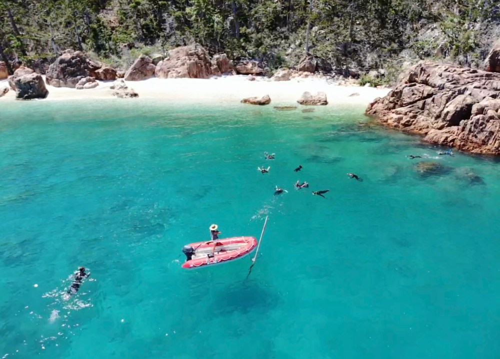 a group of people in a body of water