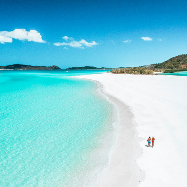 a body of water with Whitehaven Beach in the background