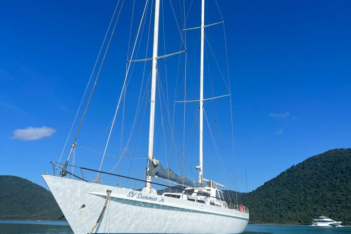 a small boat in a large body of water