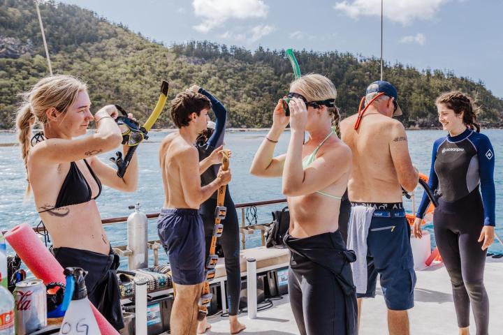 a group of people that are talking to each other