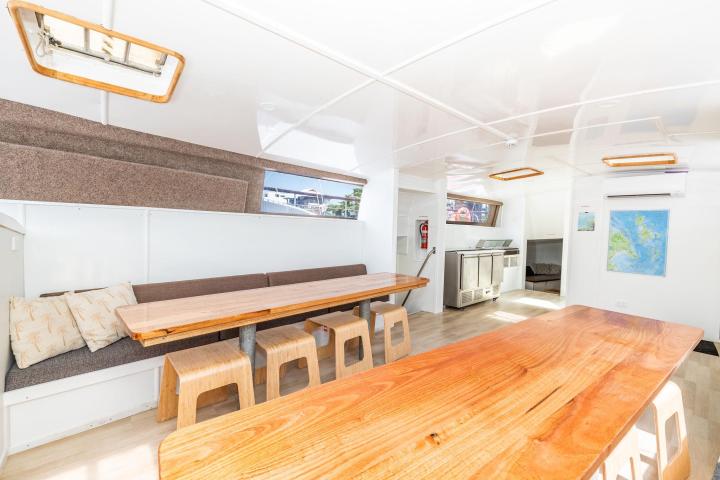 a kitchen with a table in a room